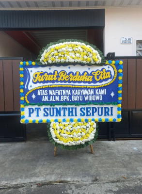 Papan Bunga Duka di Teras Bendung