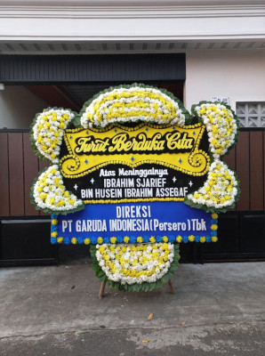 Papan Bunga Duka di Teras Bendung